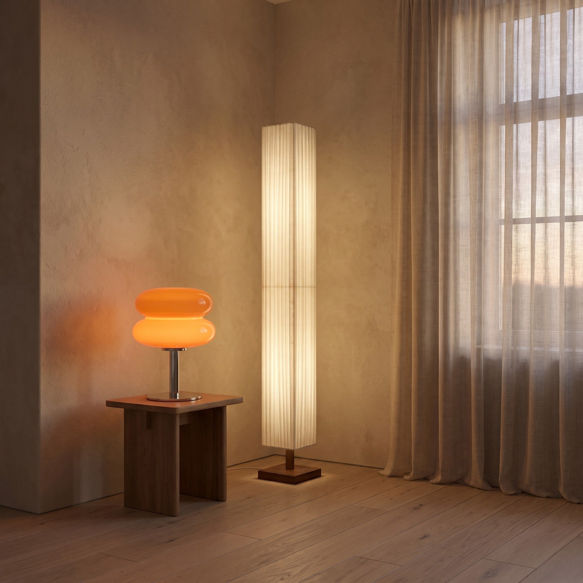 Two lit Muto Space lamps in a warm plaster room with sheer curtains and a white oak floor