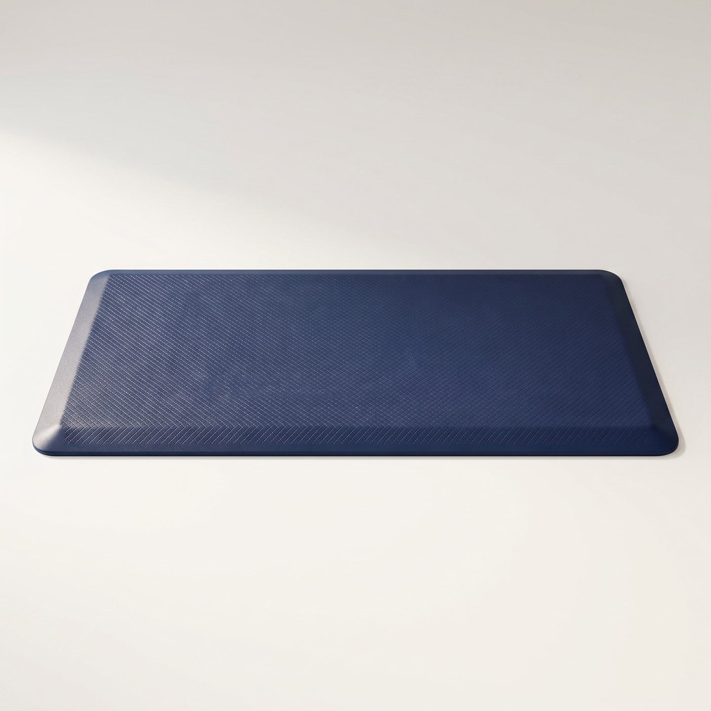 Anti-fatigue PVC kitchen mat, studio packshot on off-white background