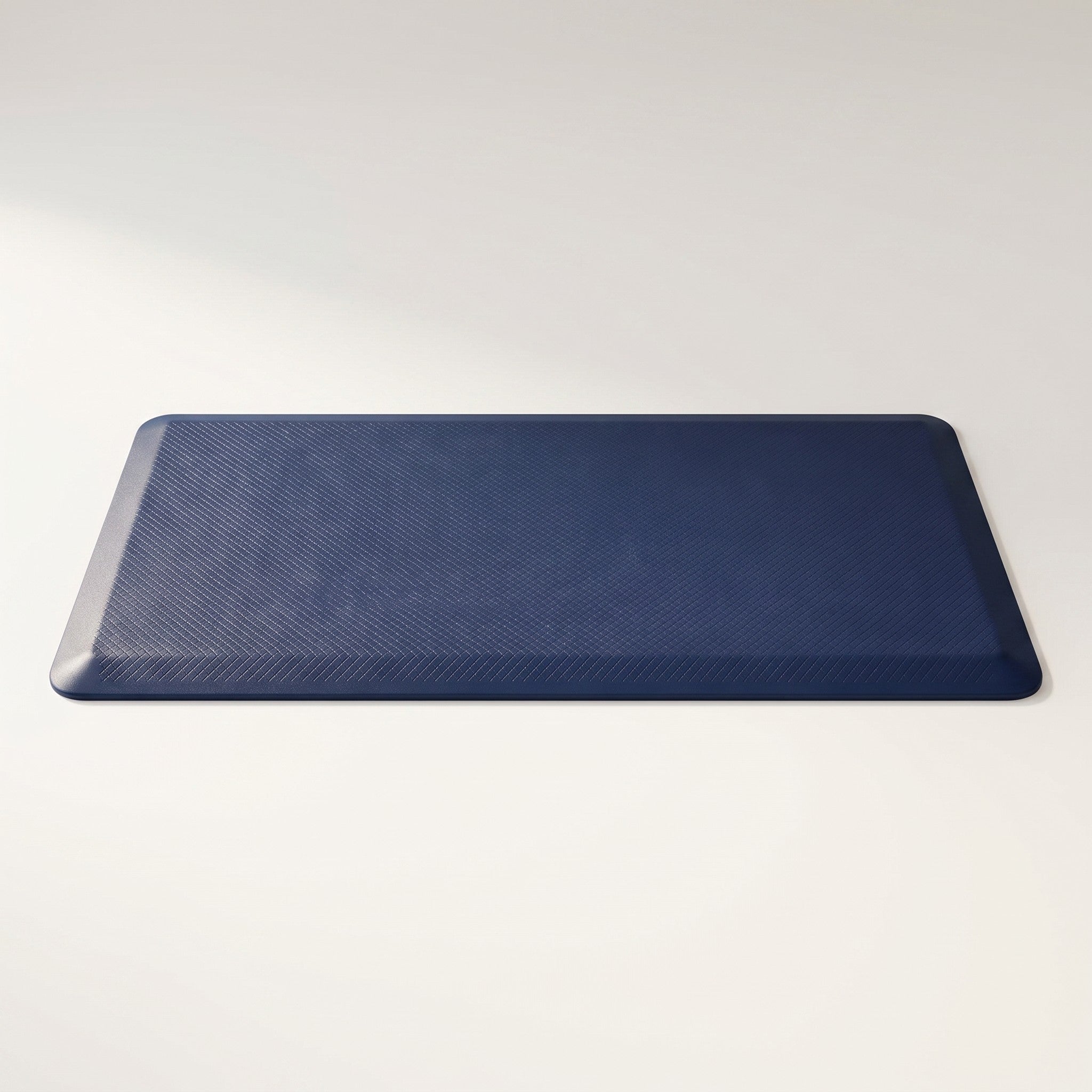 Anti-fatigue PVC kitchen mat, studio packshot on off-white background
