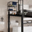 Close-up detail of iron over-toilet storage shelf