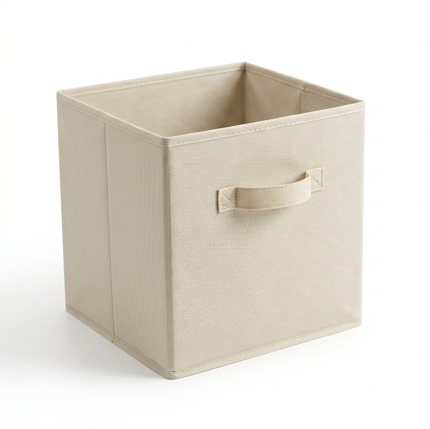 Beige storage box with a handle on a white background