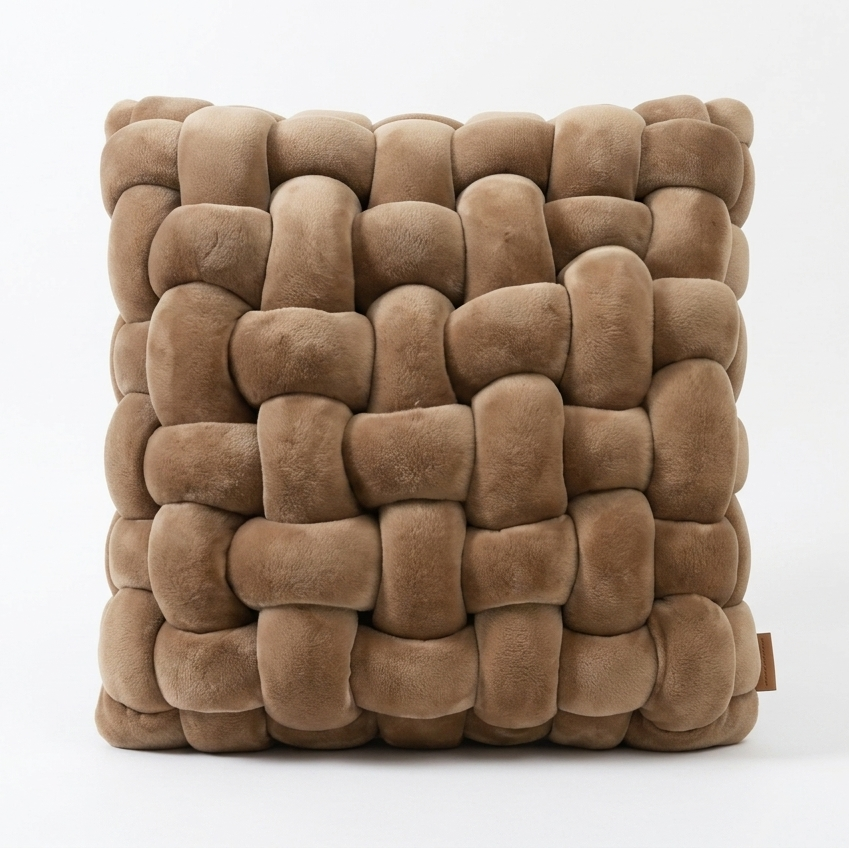 Chunky knit accent pillow in russet, white background