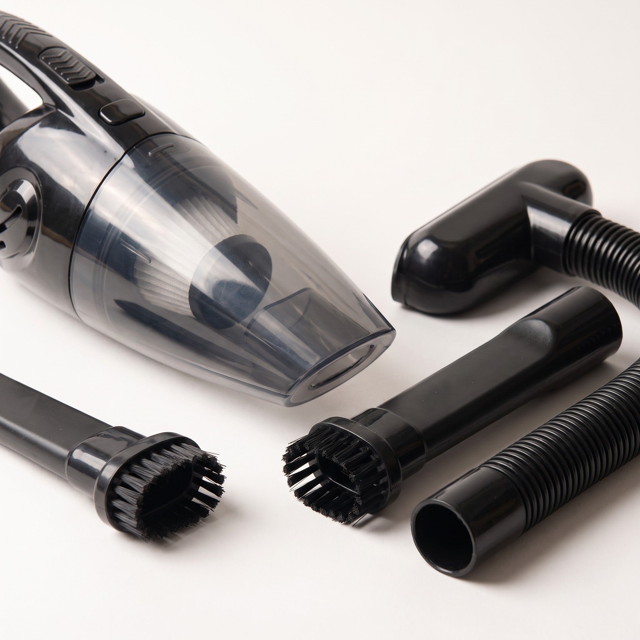 Close detail of the vacuum's nozzle and attachments