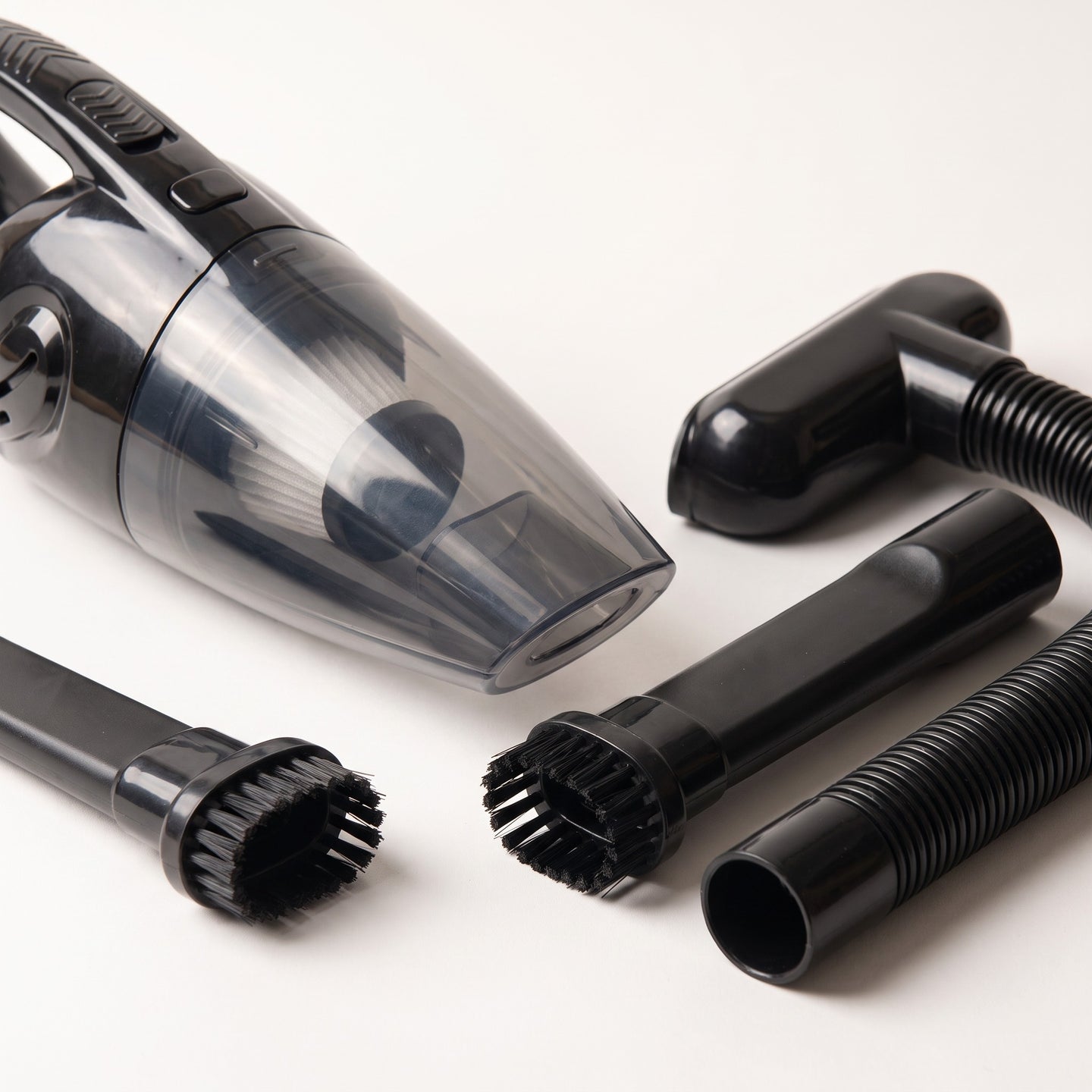 Close detail of the vacuum's nozzle and attachments