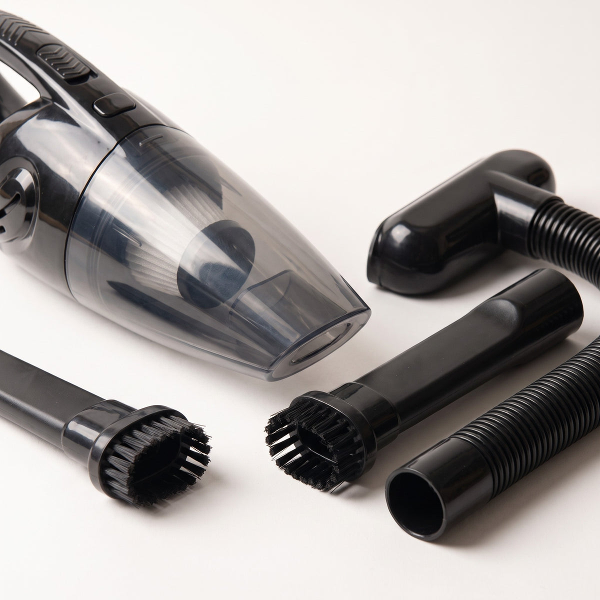 Close detail of the vacuum's nozzle and attachments
