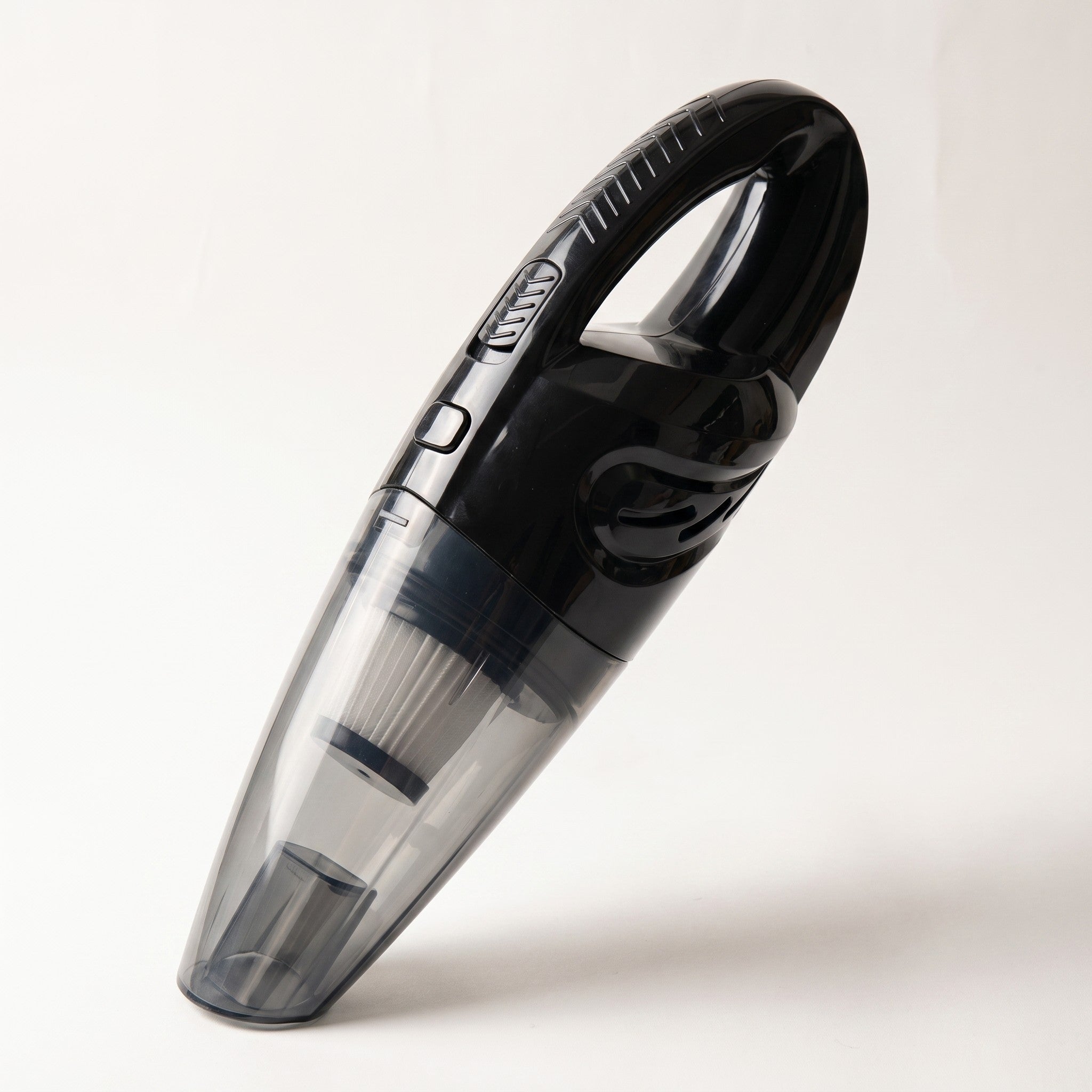Cordless handheld car vacuum, studio packshot on off-white background