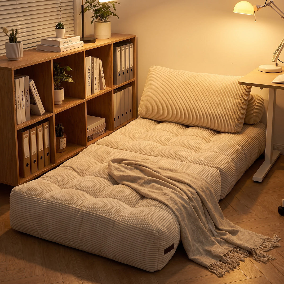 Compact Corded Fabric Chair Bed unfolded in a home office nook