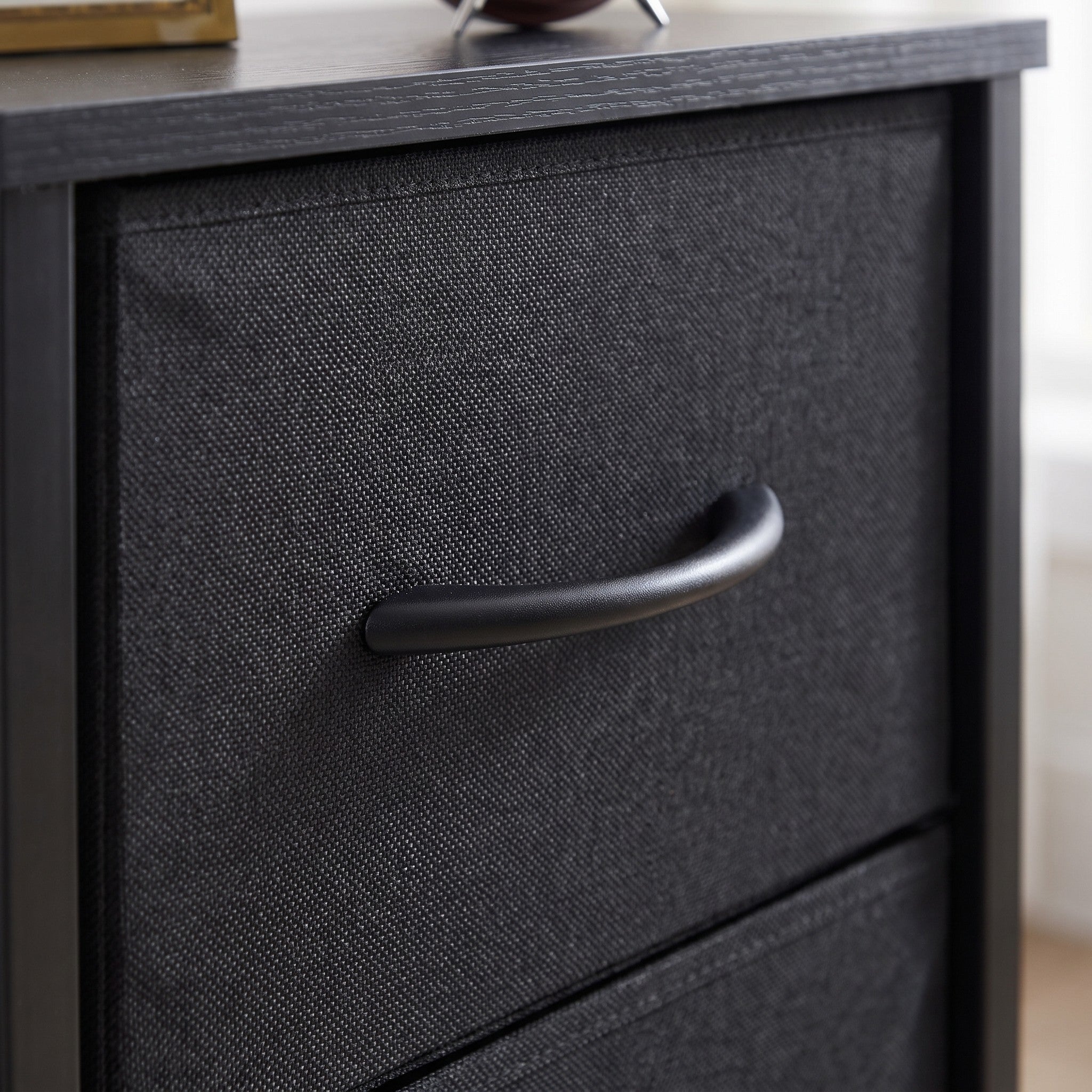 Close-up detail of fabric drawer nightstand texture