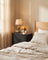 Fabric drawer nightstand styled in a bedroom scene