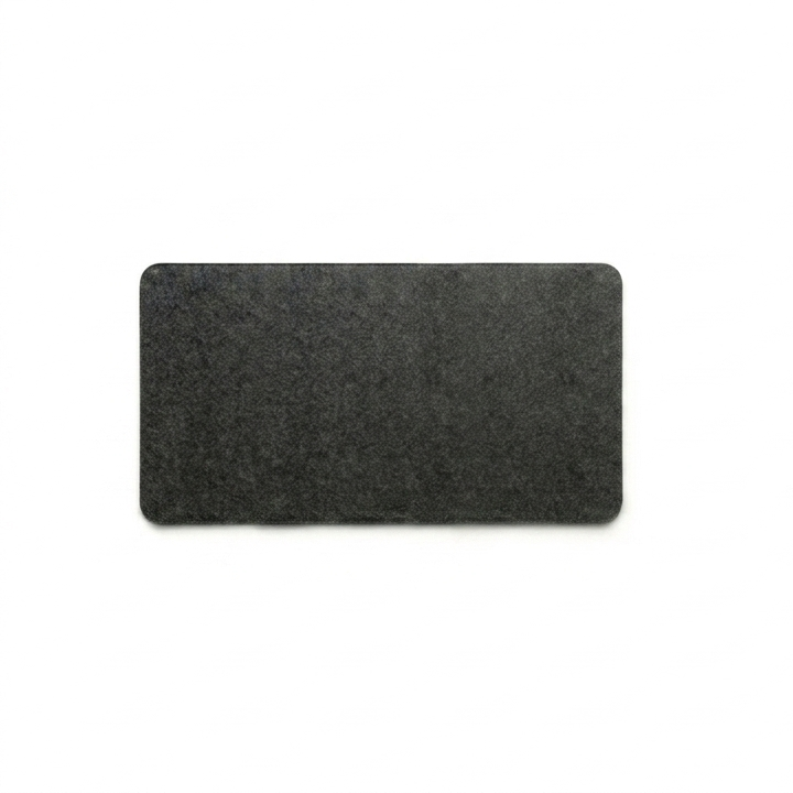 Rectangular black felt mat on a white background