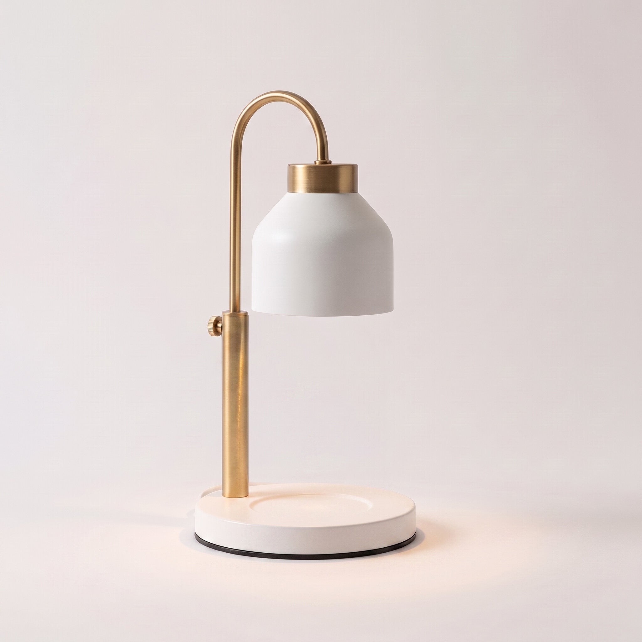 Dual-bulb candle warmer lamp in white shown alone with an empty base on a plain off-white background