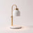 Dual-bulb candle warmer lamp in white shown alone with an empty base on a plain off-white background