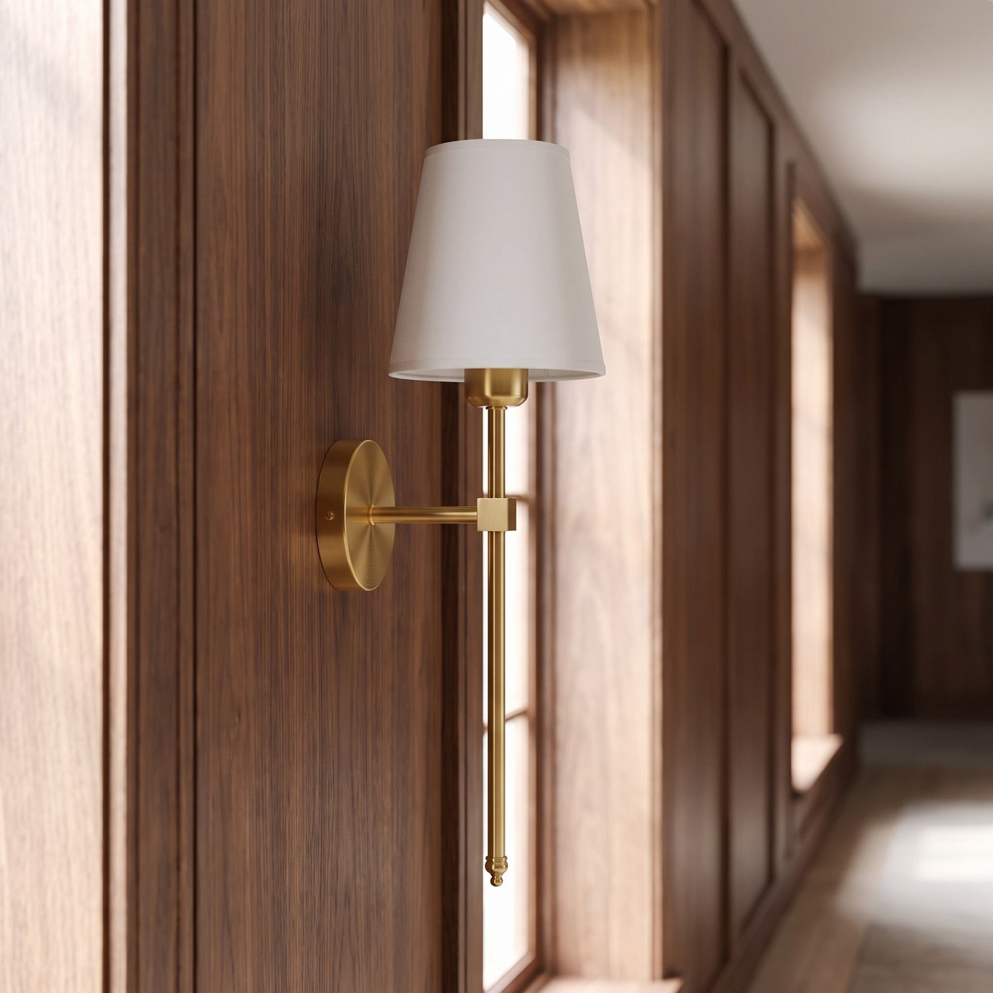 Gold cordless fabric shade wall sconce in a hallway scene