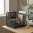 Organized desk with a computer setup, desk organizer, and office supplies.