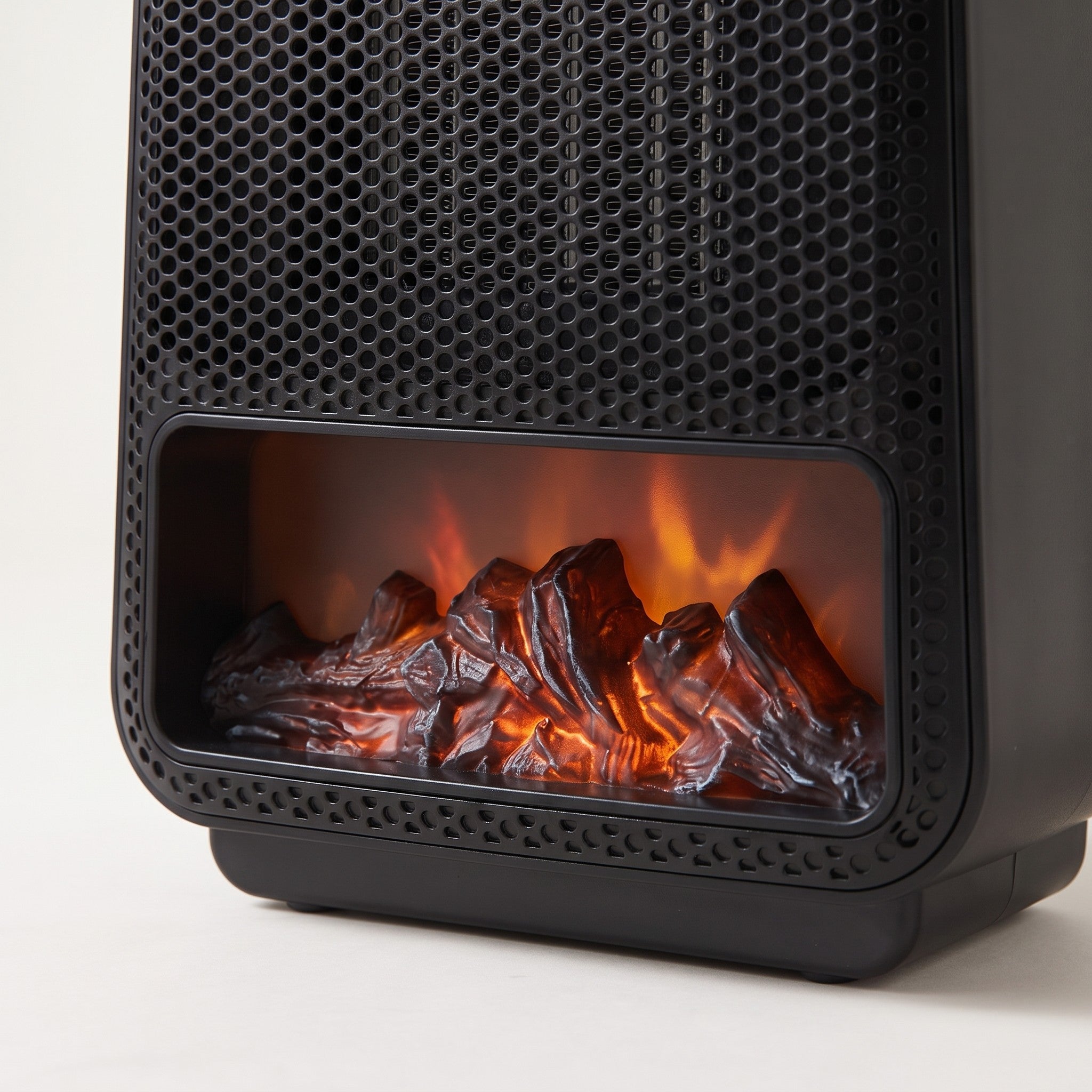 Close detail of the heater's lit flame-effect window