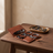 PU Leather Tech Organizer Case open on a walnut desk with cables tucked into its loops