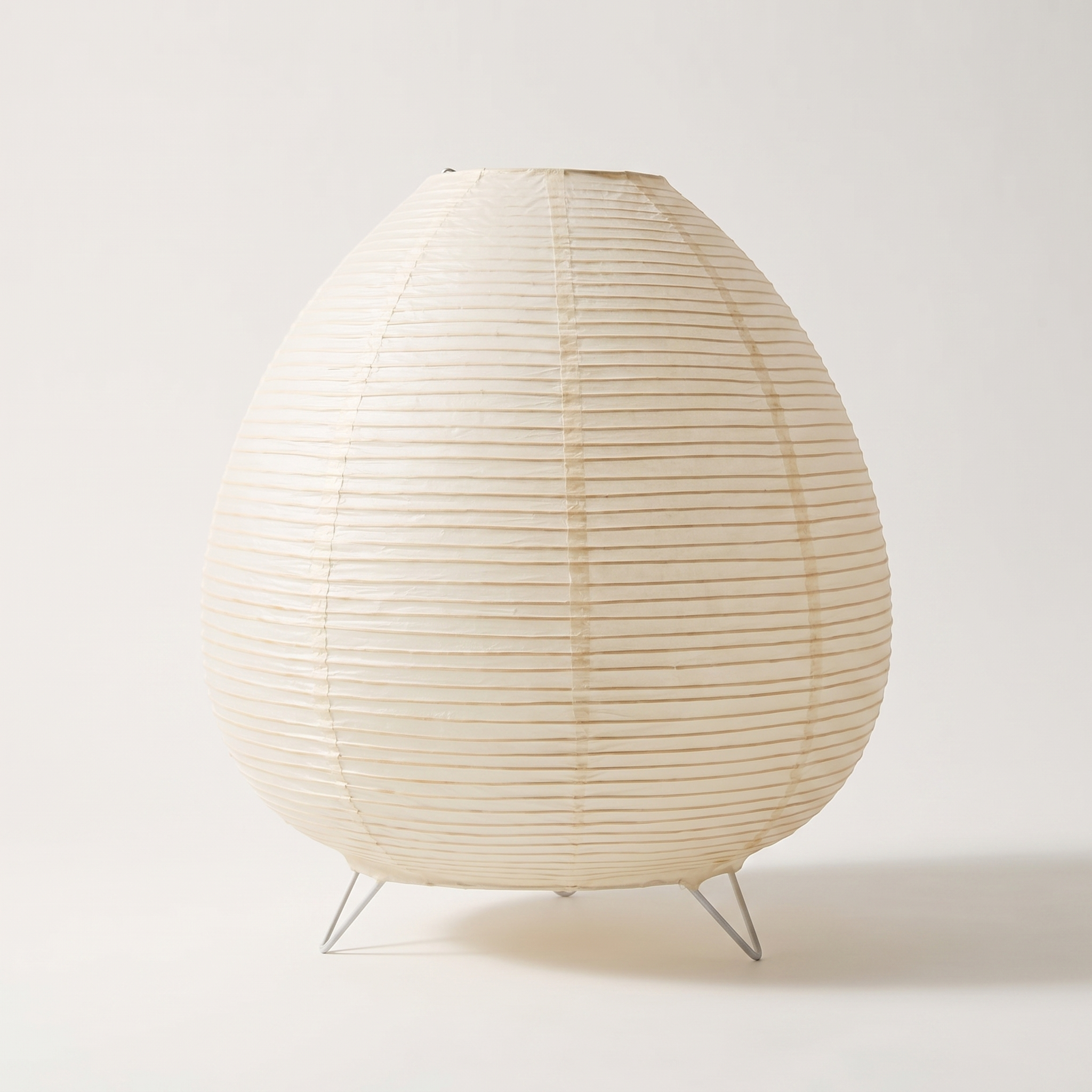 Rice Paper Lantern Table Lamp — studio hero, unlit