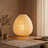Rice Paper Lantern Table Lamp — lit room scene