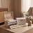 Arched three-layer jewelry box, white finish, styled in a room scene