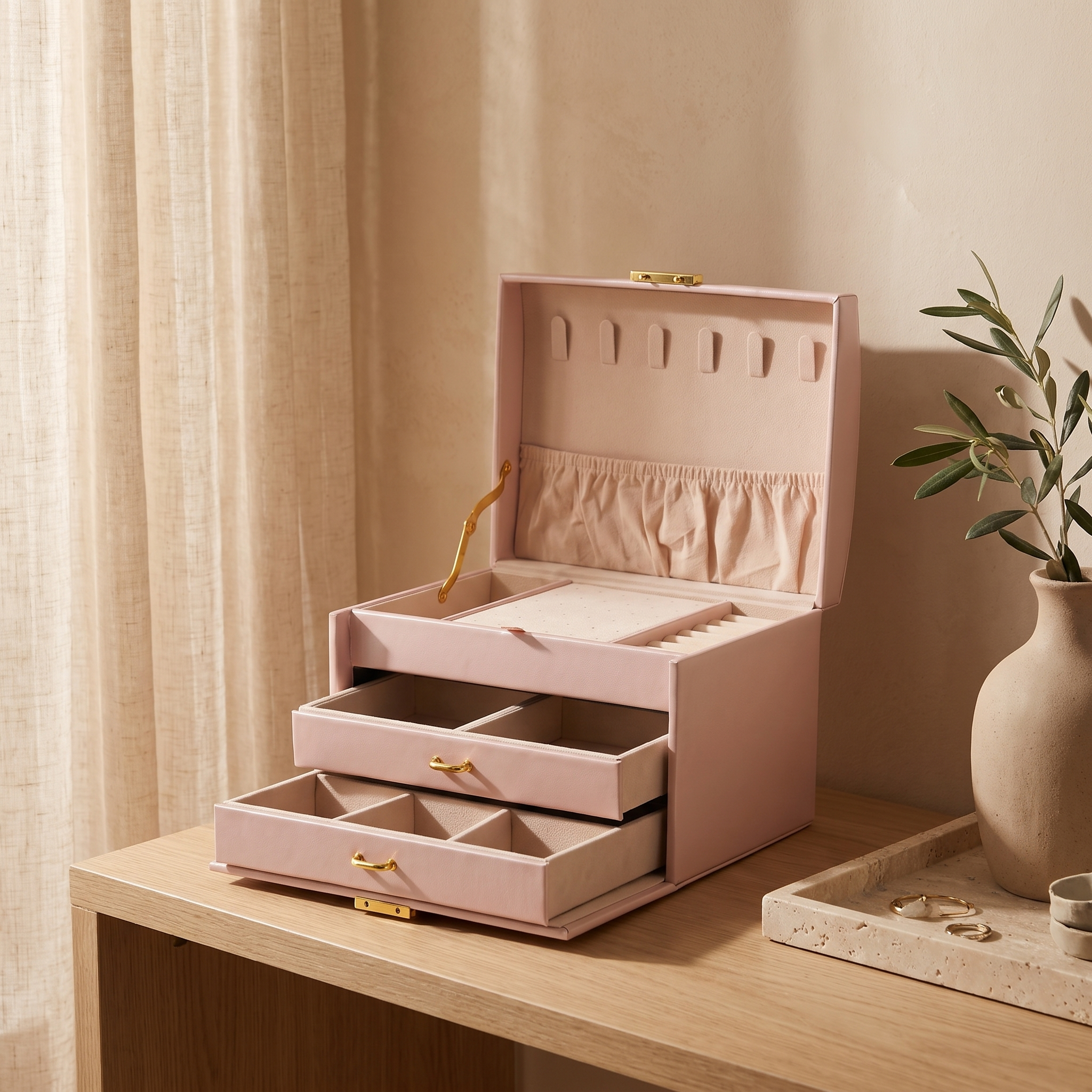 Arched three-layer jewelry box, pink finish, styled in a room scene