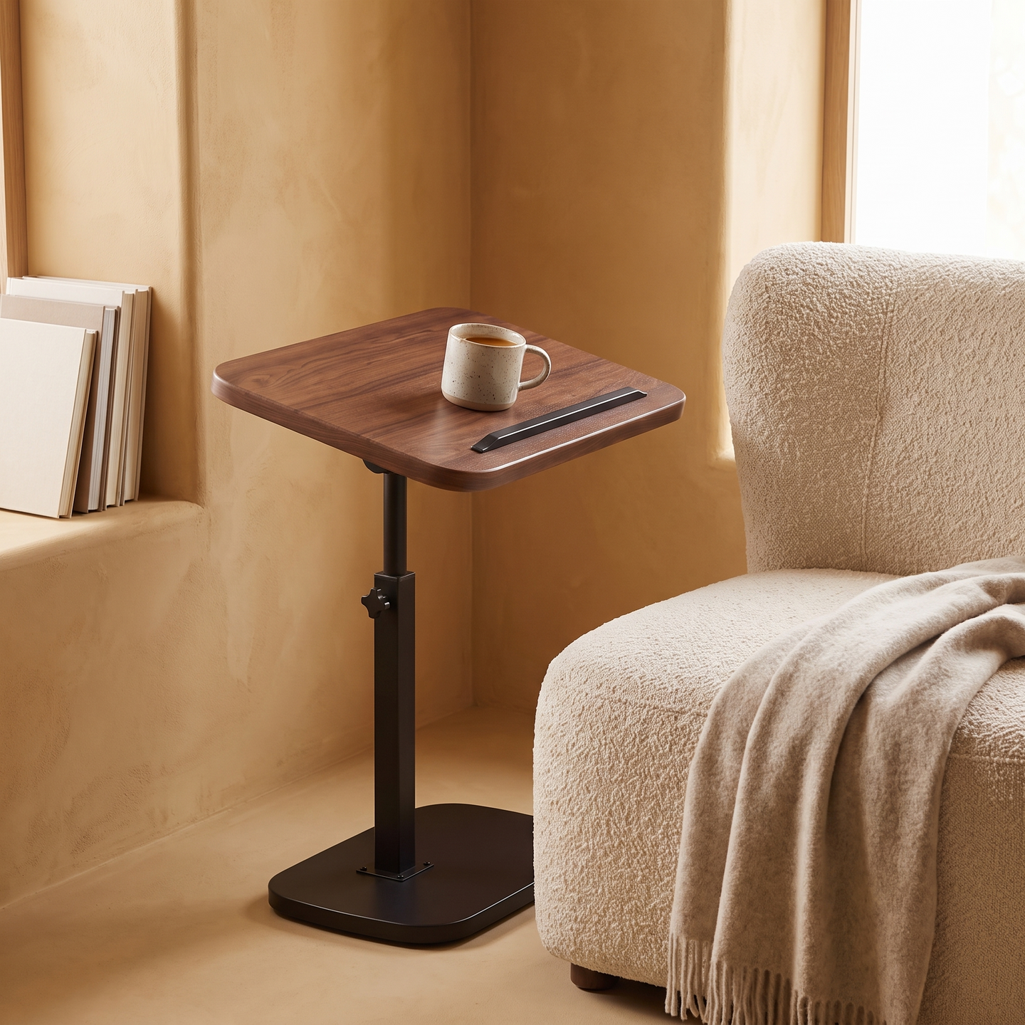Height-Adjustable C-Shaped Side Table beside an accent chair with a mug on the tilted top