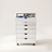Rolling 7-drawer storage cabinet in white finish, top drawer open showing folded clothing and office supplies inside