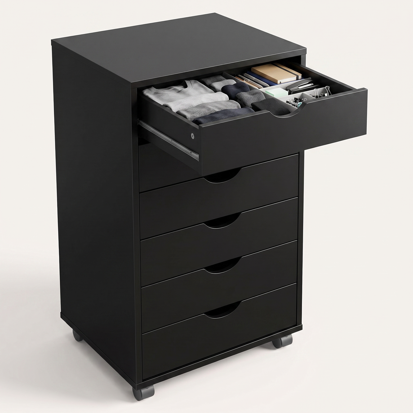 Rolling 7-drawer storage cabinet in black finish, top drawer open showing folded clothing and office supplies inside