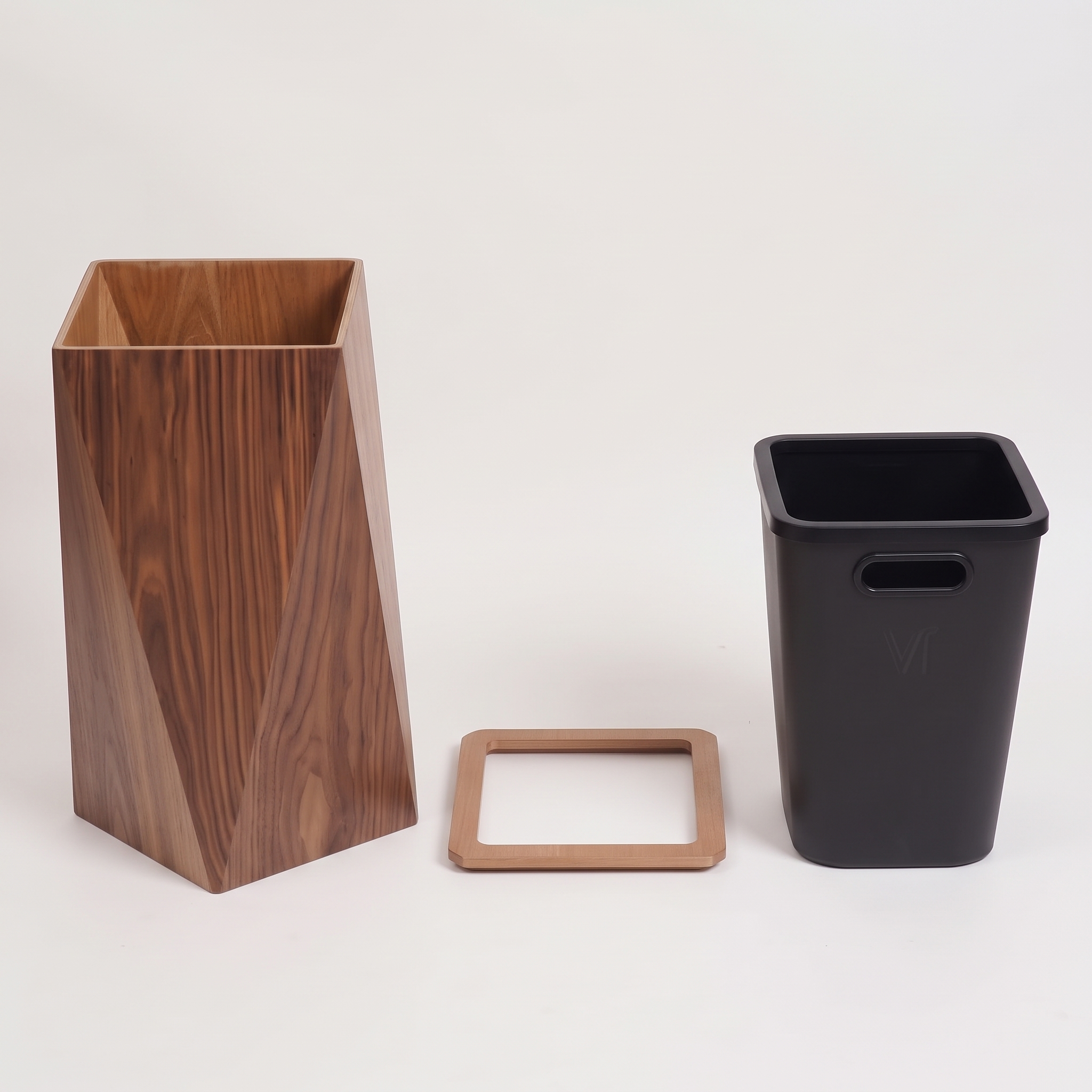 The bin's three components: wood body, removable wood rim, and liner bucket, laid out separately