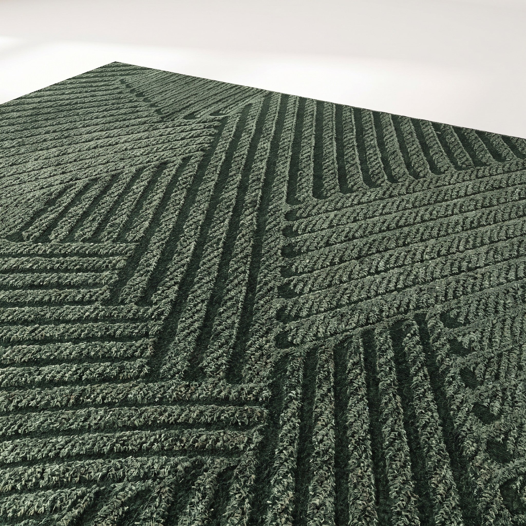 Close-up of textured non-slip entry mat surface in green