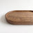 Oval wood tray, detail of grain and curved interior