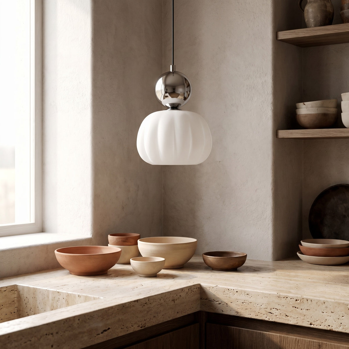 Single-head chrome pumpkin pendant light in a kitchen scene