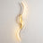 Ribbon curve wall sconce in gold, 39.4 in, lit