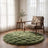 Green fleece rug styled in a reading nook scene