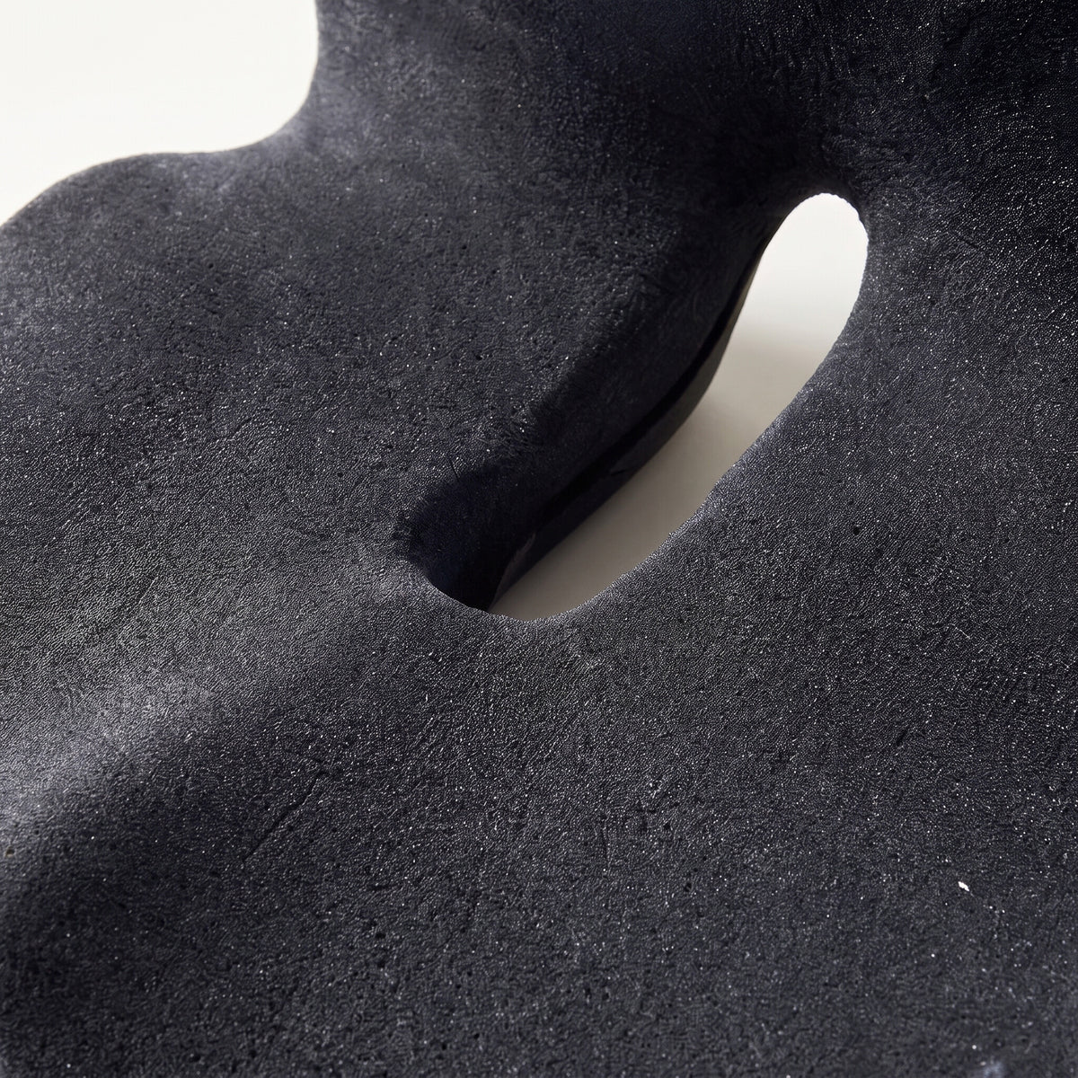 Contoured memory foam seat cushion, foam and cutout detail