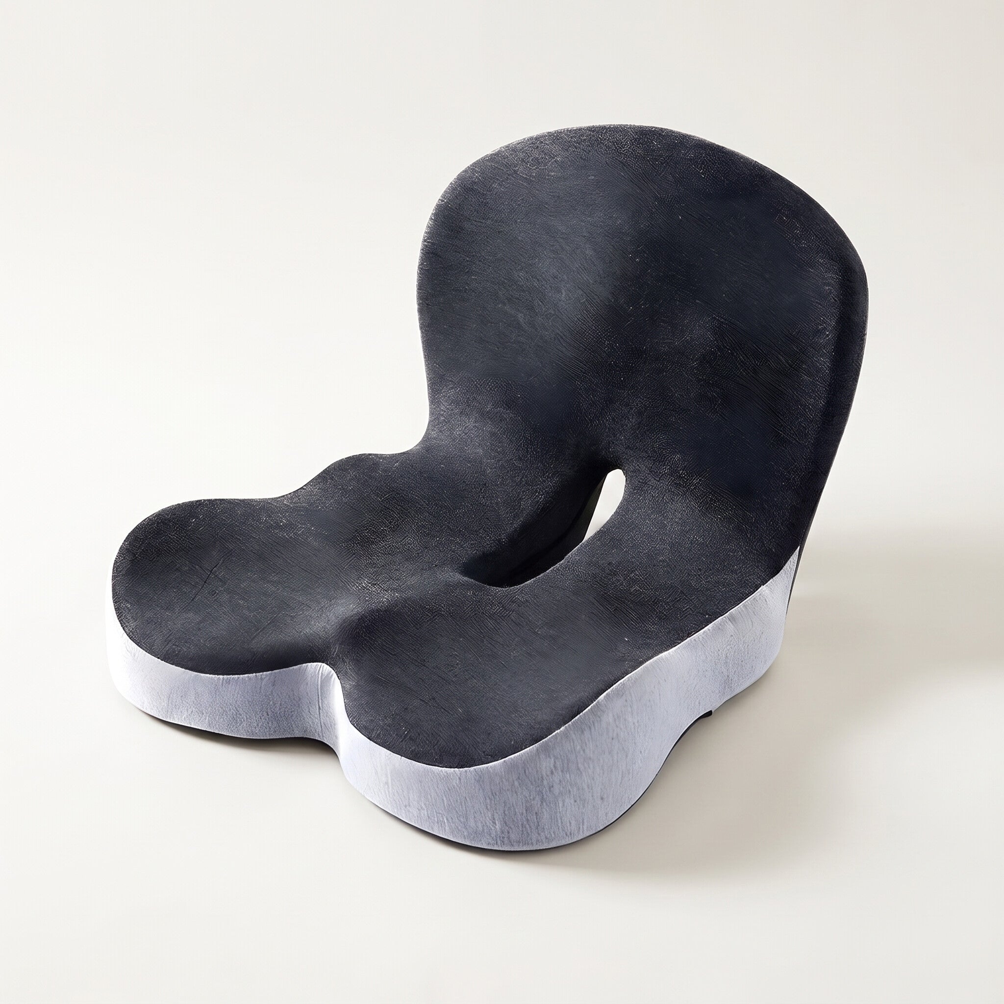 Contoured memory foam seat cushion, studio white background