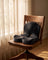 Contoured memory foam seat cushion on a walnut desk chair