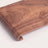 Rectangular wood serving tray, detail of grain and rolled edge