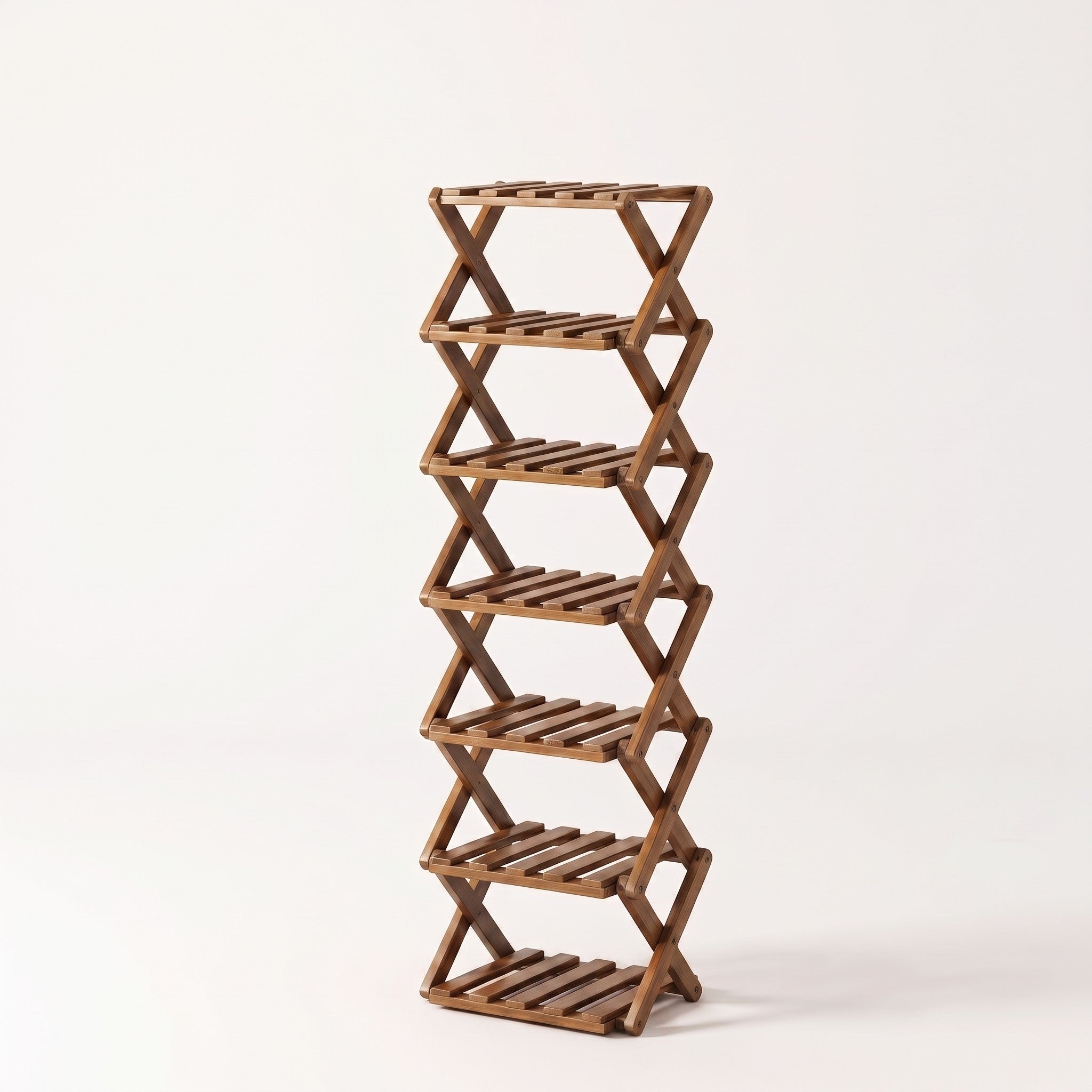 Bamboo folding shoe rack in dark bamboo, white studio packshot