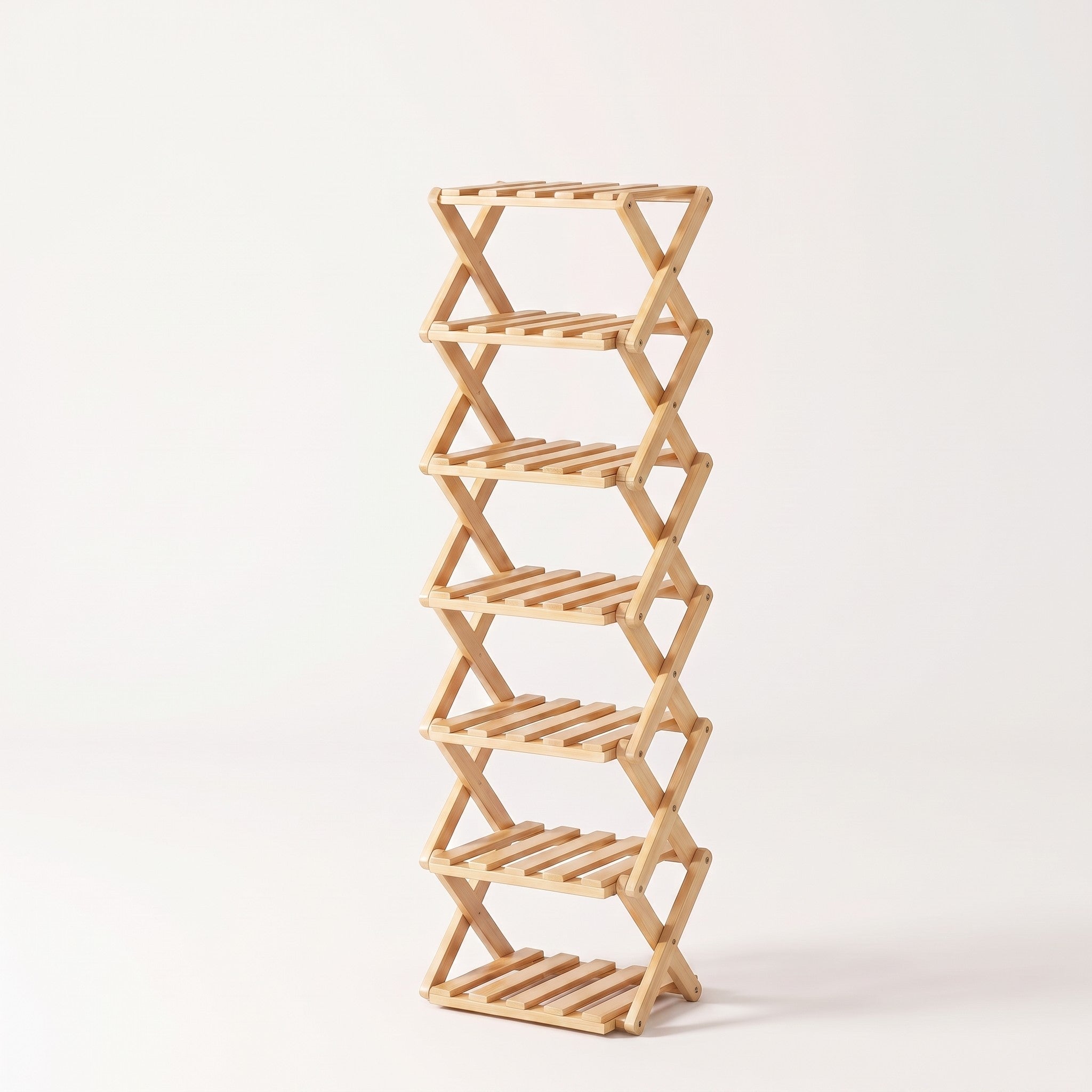 Bamboo folding shoe rack in natural bamboo, white studio packshot