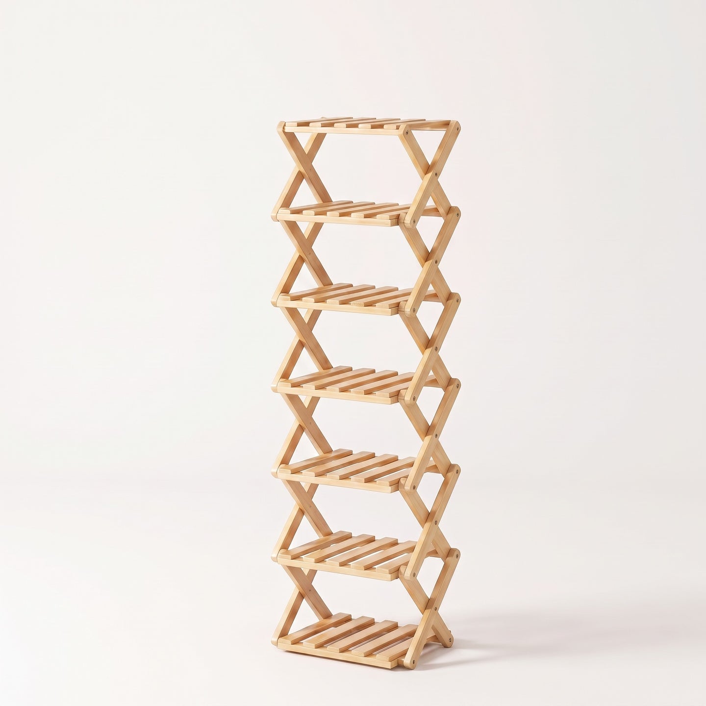 Bamboo folding shoe rack in natural bamboo, white studio packshot
