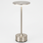 Silver side table with round top and cylindrical base on a white background