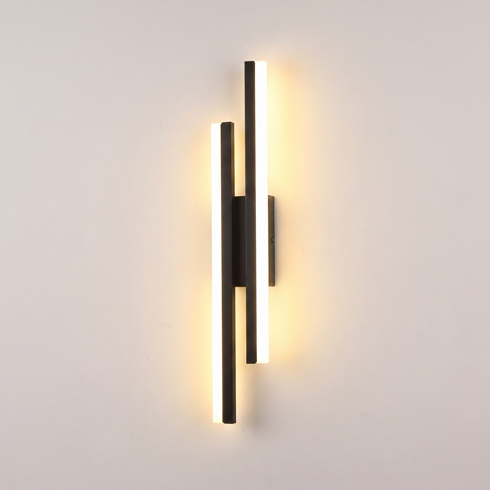 Slim acrylic wall sconce, left-facing, lit