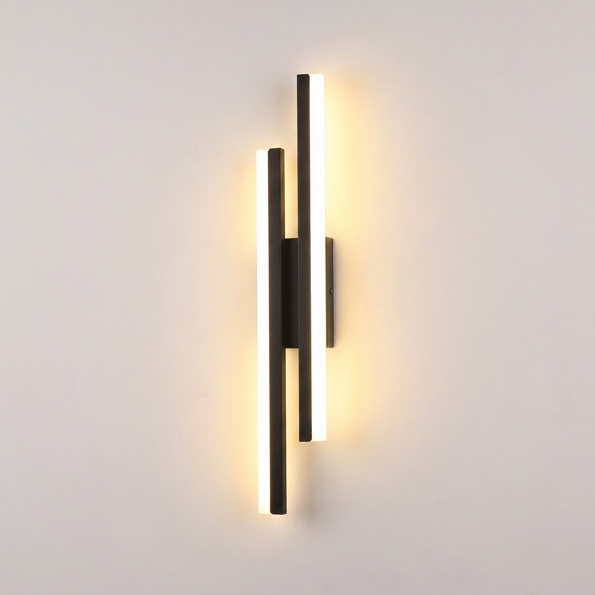 Slim acrylic wall sconce, left-facing, lit