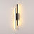 Slim acrylic wall sconce, left-facing, lit