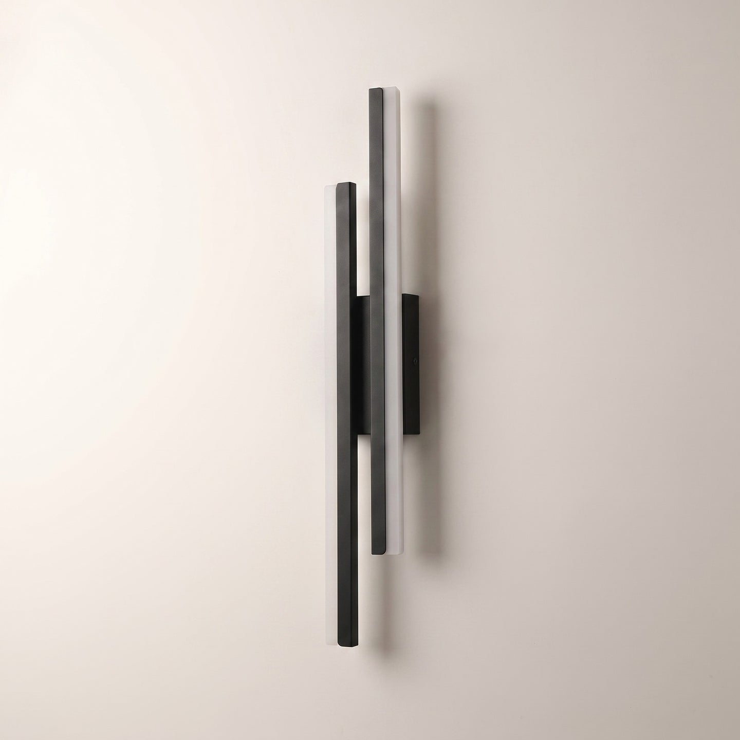 Slim acrylic wall sconce, left-facing, studio packshot