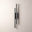 Slim acrylic wall sconce, left-facing, studio packshot