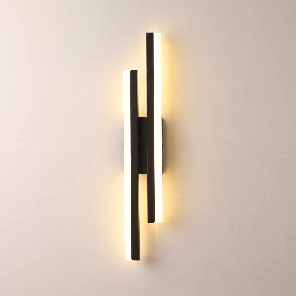 Slim acrylic wall sconce, right-facing, lit