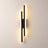 Slim acrylic wall sconce, right-facing, lit