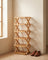 Bamboo folding shoe rack styled in an entryway scene