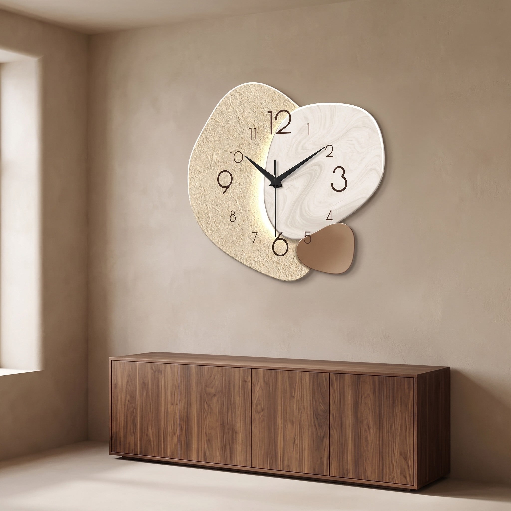 Three Pebble Silent Wall Clock hanging above a low walnut sideboard, seen from across the room to show its size.